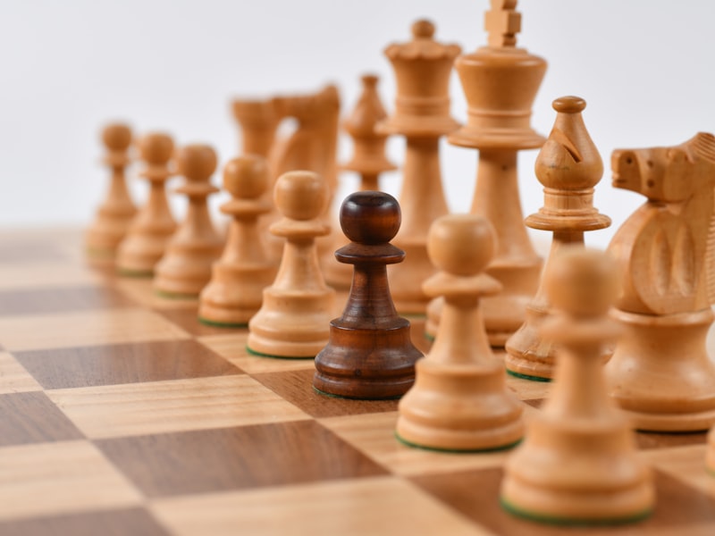 A wooden chess set mid-game